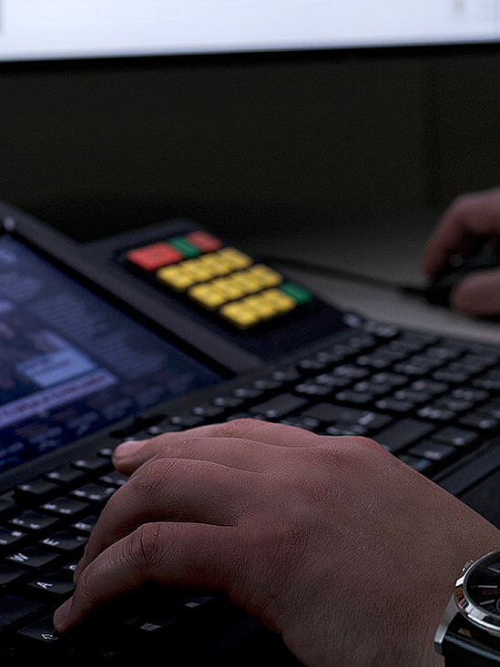 Male hand operates a WEYTEC smartTOUCH keyboard for an optimal user experience